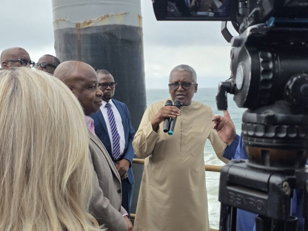 Aliko Dangote addresses Femi Otedola and other First HoldCo senior executives during their visit.