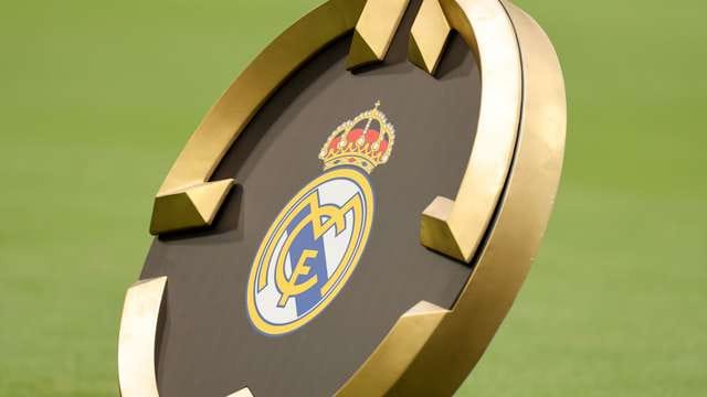 Real Madrid team in a huddle before a match
