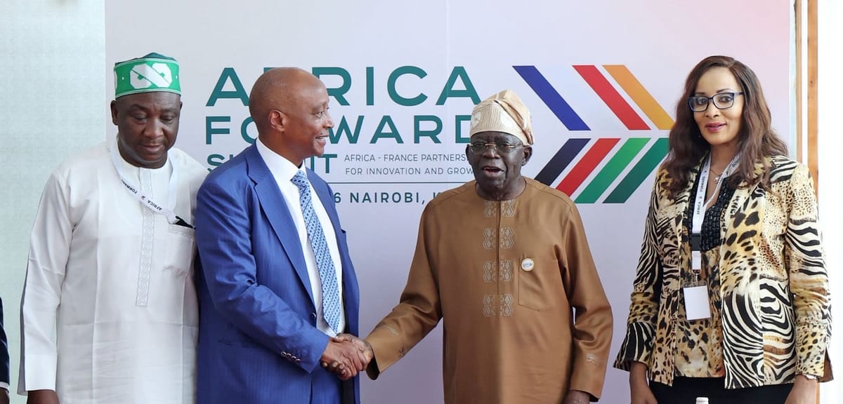 President Bola Tinubu (right) and Confederation of African Football President, Patrice Motsepe, discussing Nigeria's proposal to host the 2026 CAF Awards.
