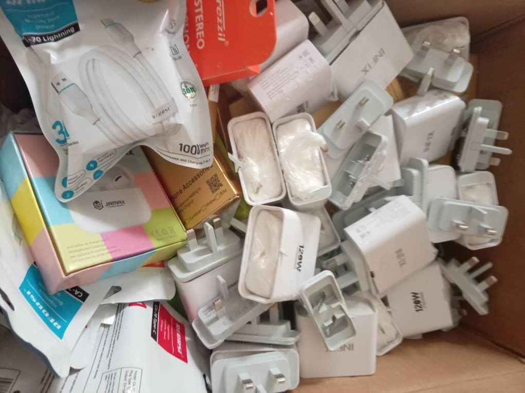 Phone chargers used to conceal cocaine, recovered from the suspect's residence.