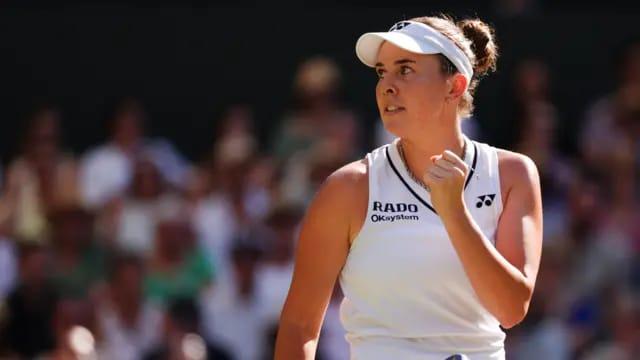 Linda Noskova celebrates a successful point with a fist pump during the Wimbledon 2026 women's final.