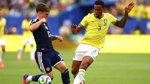 Brazil's Vinicius Jr dribbles past a Scotland defender during the FIFA World Cup 2026 qualifier.