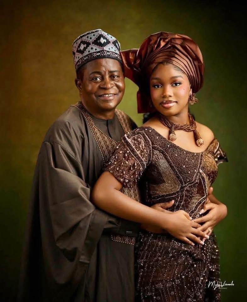 A joyful photo of Senator Dangana Ocheja, 74, and his bride, Winifred, 18.