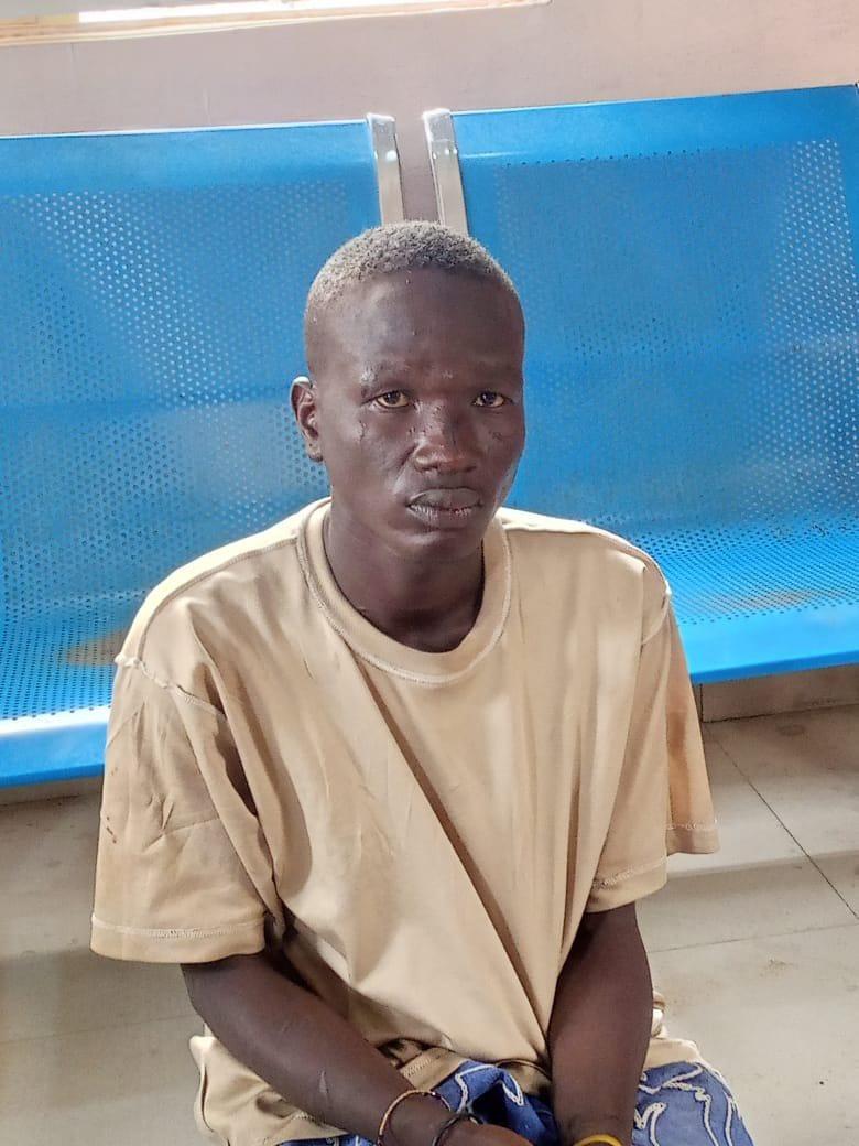 The suspect, dressed in military camouflage, allegedly stole mobile phones and other valuables from residents