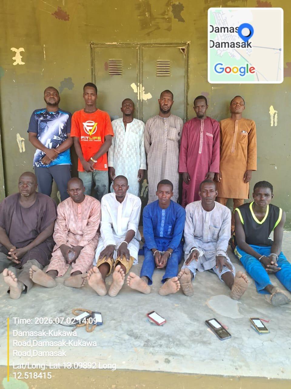 Military officials overseeing the processing of the twelve suspects linked to Boko Haram and ISWAP support networks.