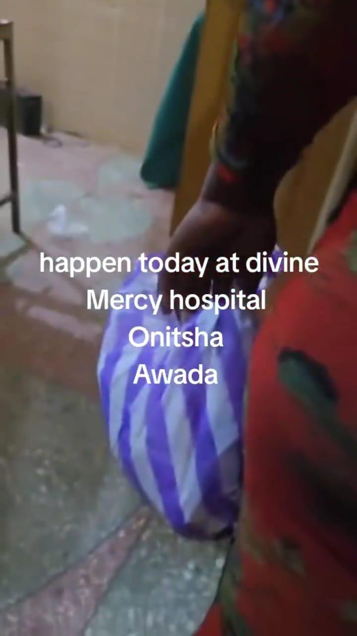 Hospital personnel questioning the alleged imposter nurse following her suspicious behaviour at Divine Mercy Hospital.