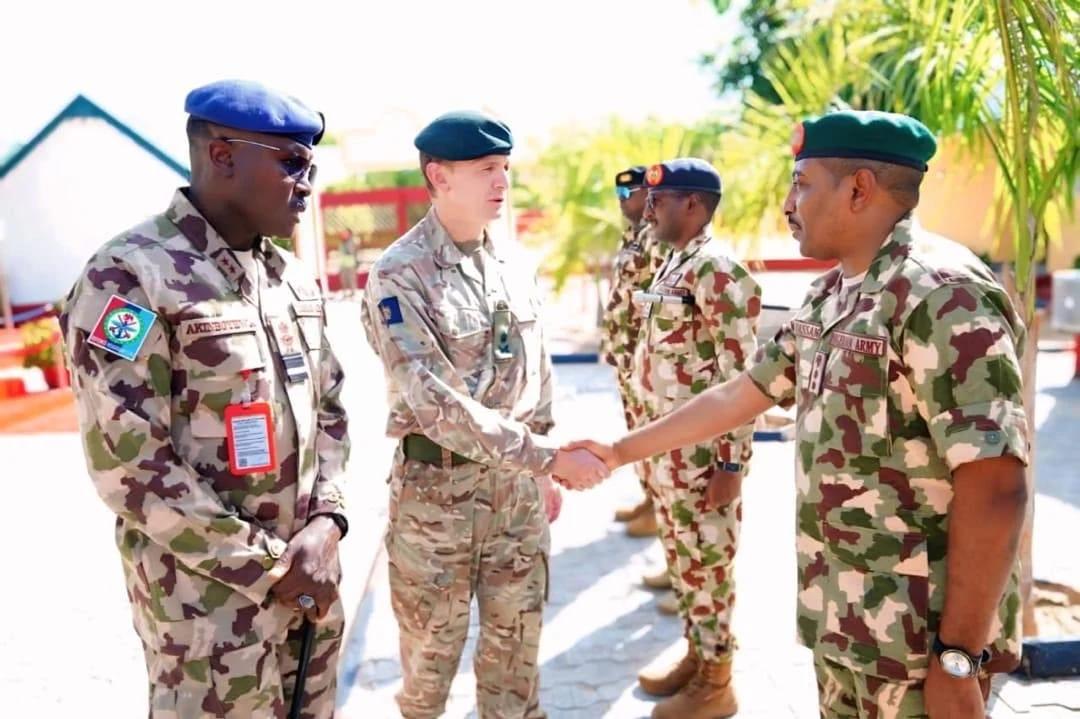 UK Deputy Chief of Defence Staff, Lt Gen Sir Charlie Collins, engages with Nigerian military officials during his visit to Maiduguri.
