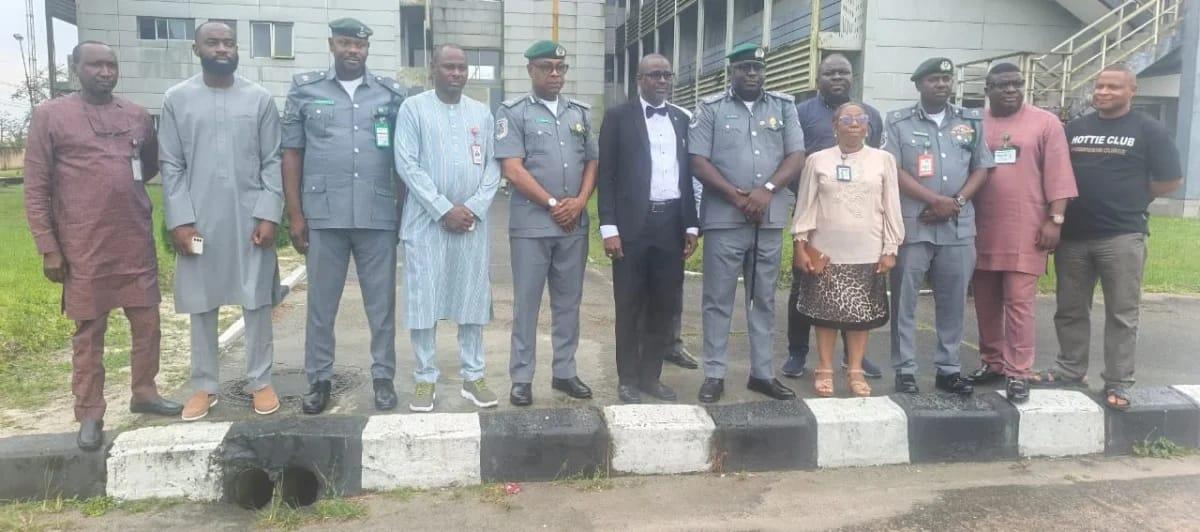 The new Edo/Delta Customs Area Controller, Dooyum Dominic Ortsen, and his management team engaging with Saadi Dahiru Mohammed, the Ports Manager of Delta Ports, Warri, during a courtesy visit.