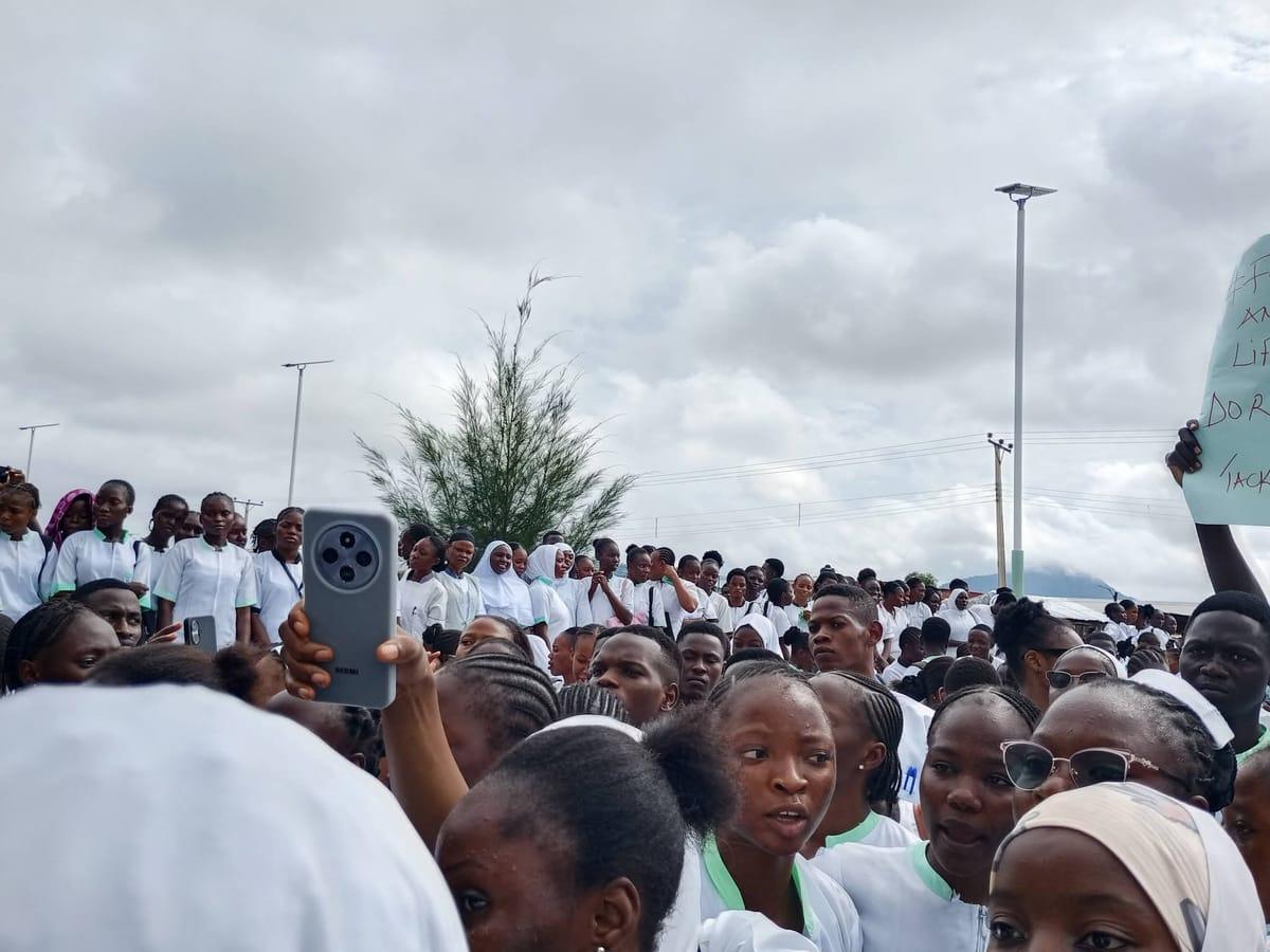 Students holding placards during their protest for improved security.