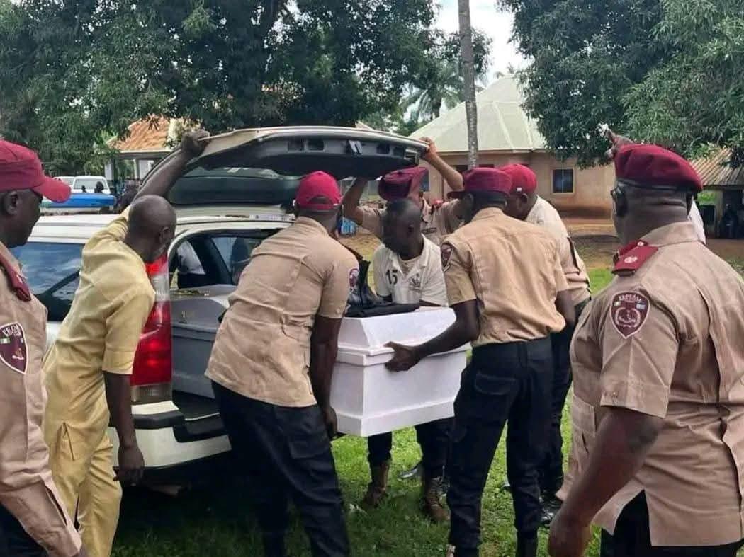 Security operatives, including FRSC officials, at a checkpoint or incident site.