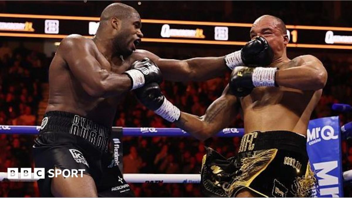 Daniel Dubois landing a powerful punch on Fabio Wardley during their WBO title rematch.