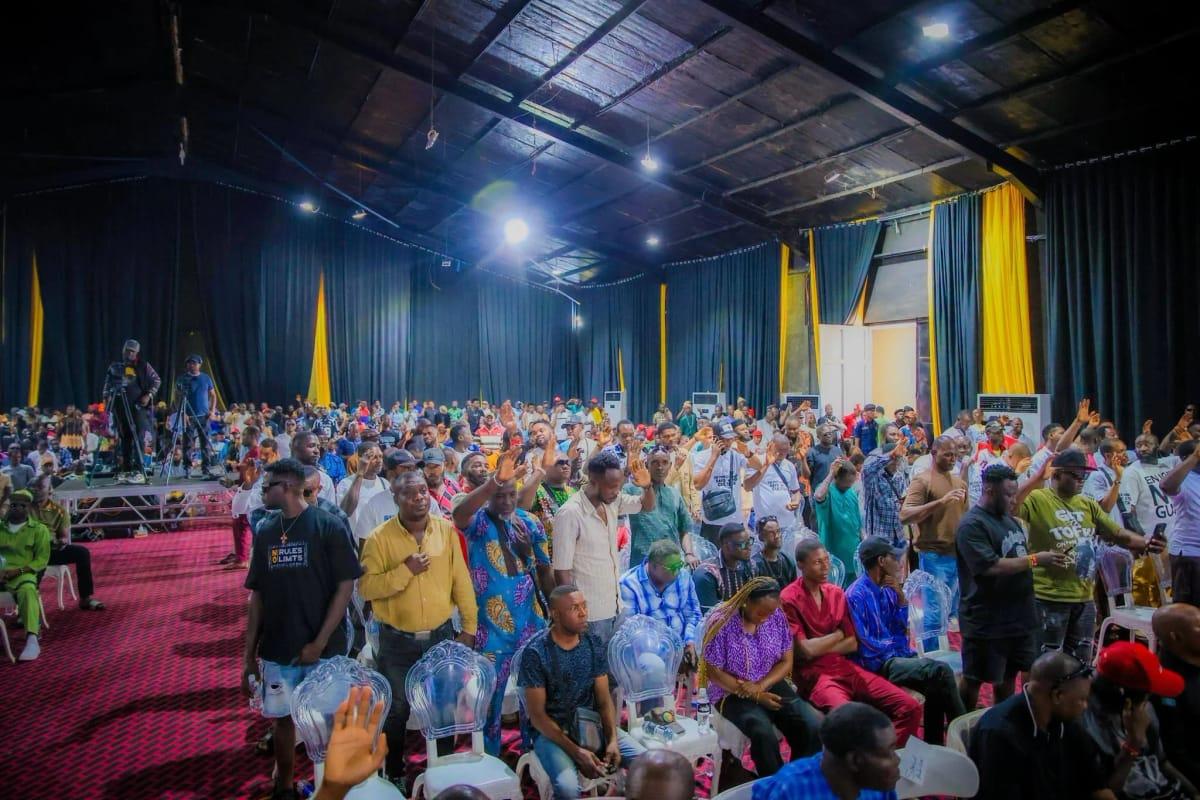 Participants listening attentively at the mass cult renunciation ceremony held at the Sir Victor Uwaifo Creative Hub in Benin City.