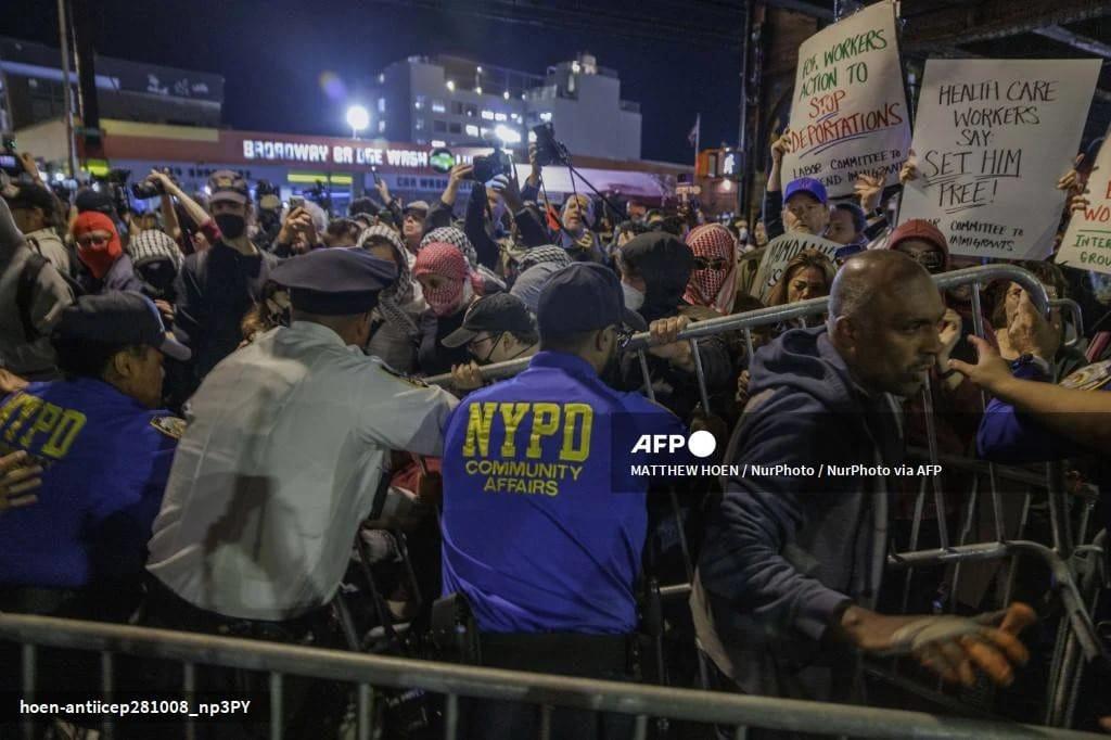 Demonstrators confront NYPD officers outside a New York hospital where a man reportedly shot by ICE agents was being treated.