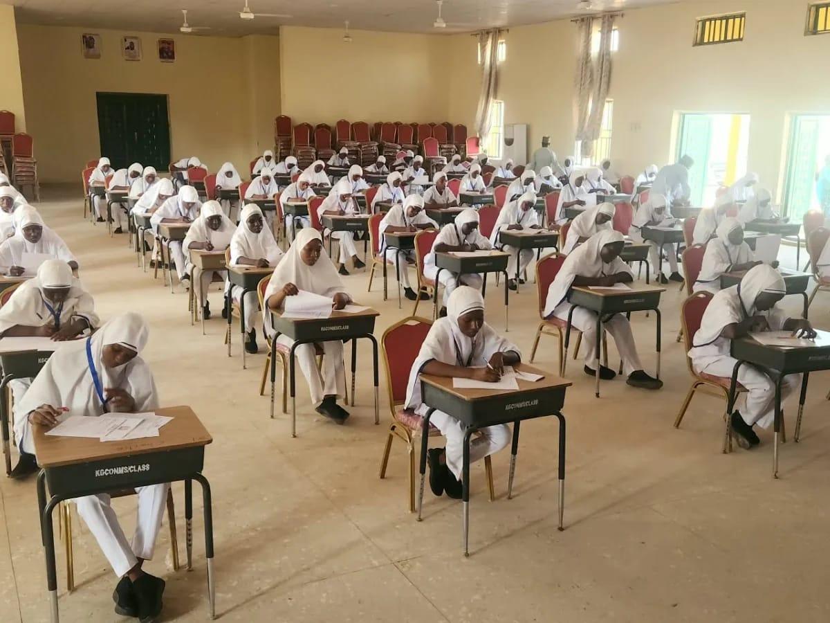 Nursing students engaged in learning activities at a college.