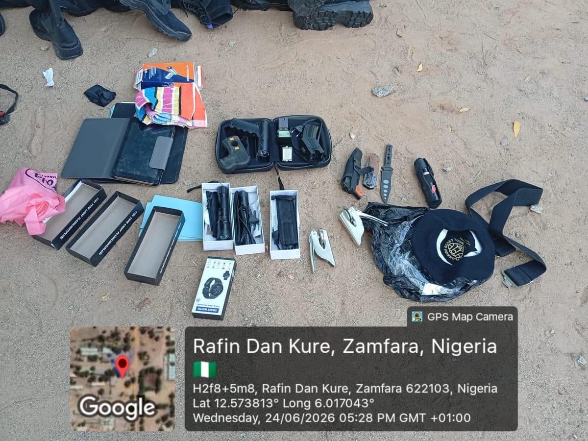 A close-up view of the 150 combat boots and other items seized from the suspect.