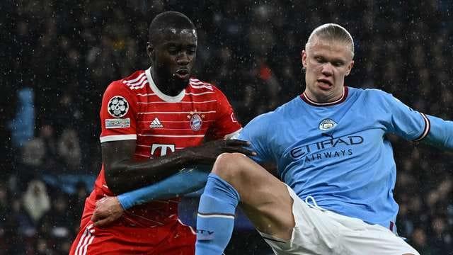 Action from a UEFA Champions League match between Manchester City and Bayern Munich.