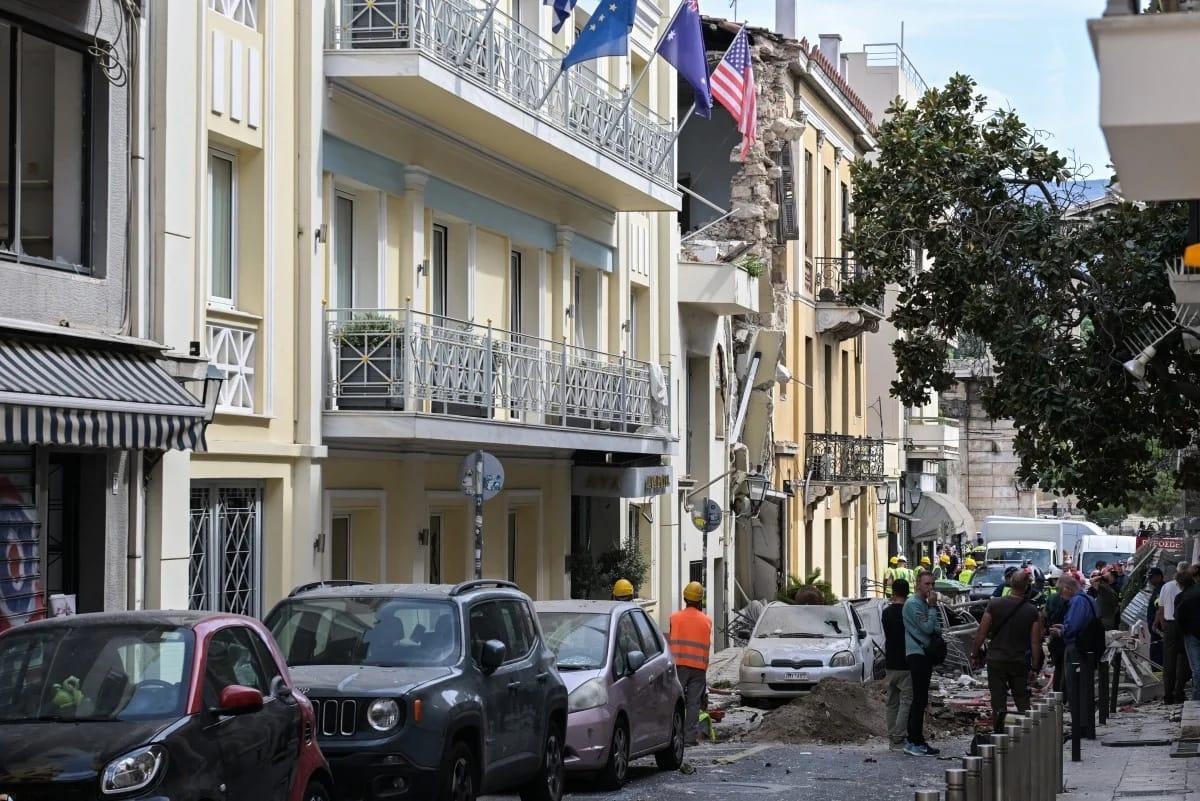Rescue operations underway amidst the debris of the collapsed building in Athens' Plaka area, September 2026.