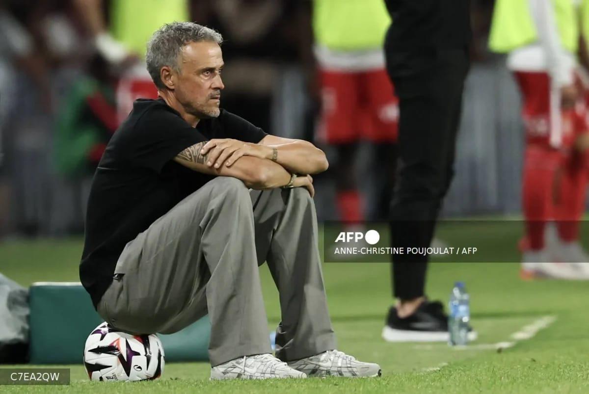 Paris Saint-Germain's head coach, Luis Enrique, observes the game from the touchline during the match against AS Monaco at the Parc des Princes.