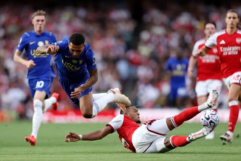 Ezri Konsa (left) dispossesses Morgan Rogers (right) during the Arsenal vs Chelsea match.