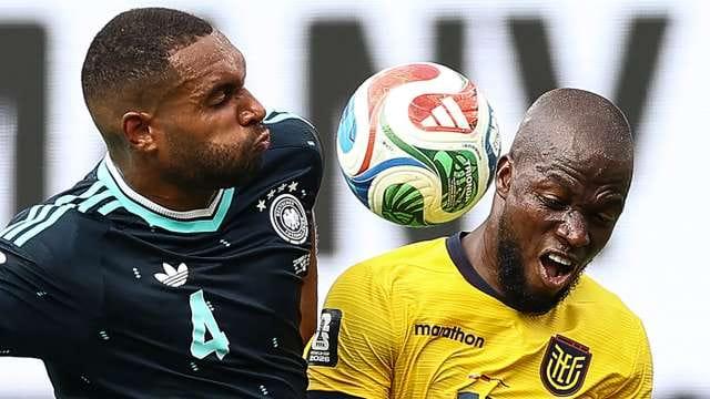 A Germany player in action against an Ecuador opponent during the FIFA World Cup 2026 tournament.