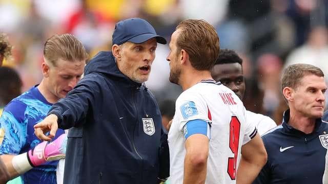 Action shot of the England and Ghana national teams competing in the FIFA World Cup 2026.