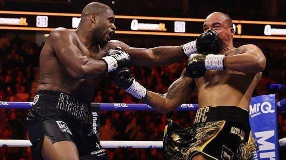 Dubois connects with a strong blow to Wardley during the fight.