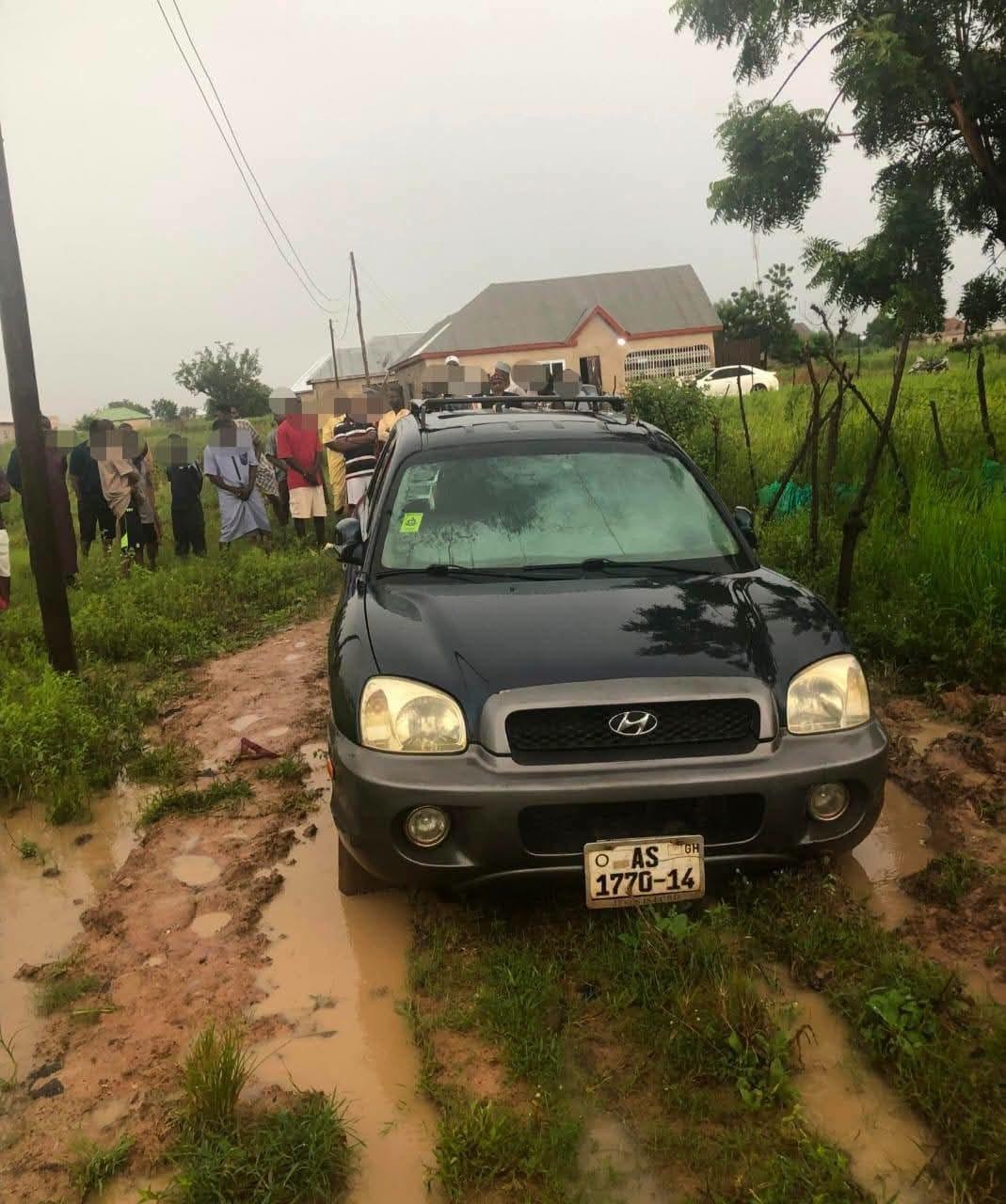 A parked vehicle, similar to the one where three missing children were found deceased in Tamale.