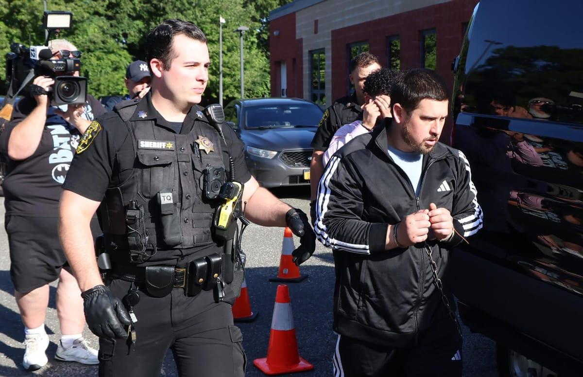 The accused, Sage Arias-Brown, in a worn track suit.
