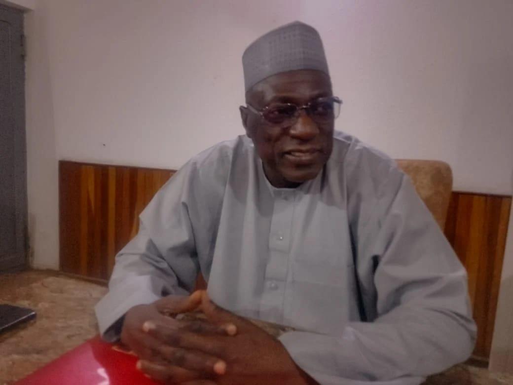 A close-up portrait of former Governor Ahmed Makarfi.