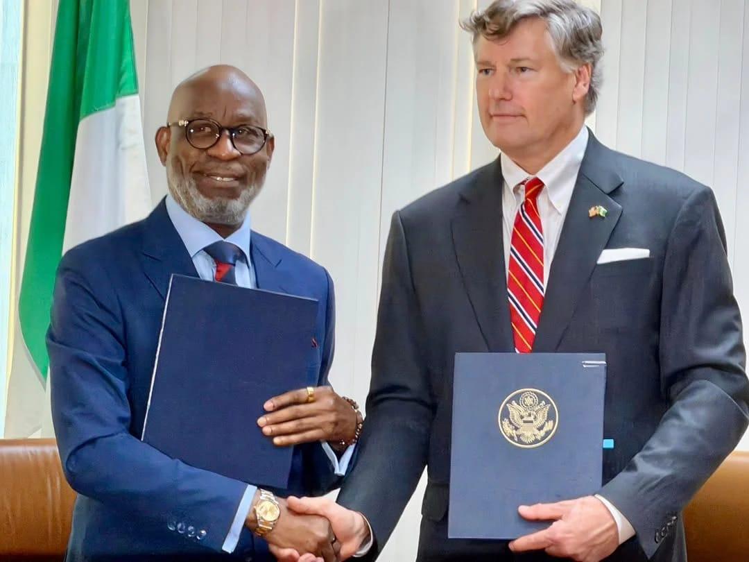 Nigeria's Minister of Solid Minerals Development, Dele Alake (left), with US Deputy Secretary of State, Christopher Landau, after signing the mining investment pact.