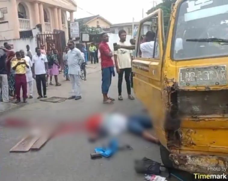 Emergency response personnel at the scene of a traffic accident in Lagos, highlighting the aftermath of a road mishap.