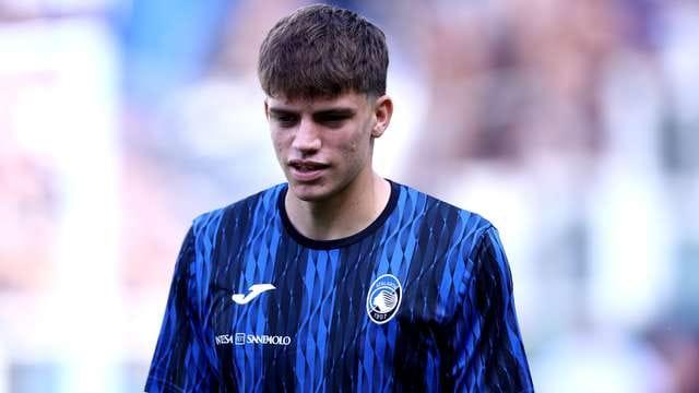 Marco Palestra in action for Atalanta, showcasing his skills on the field.