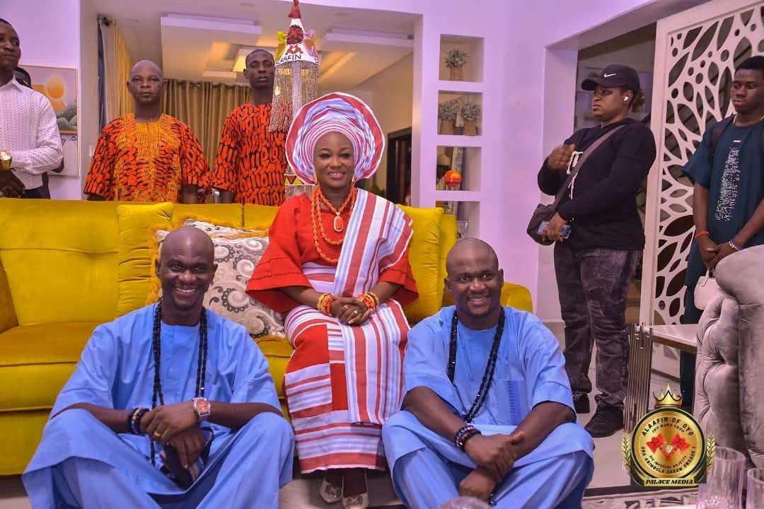 Ayaba Abiwunmi Owoade, wife of the Alaafin, (center) with twins at the World Twins Day celebration in Igbo Ora.