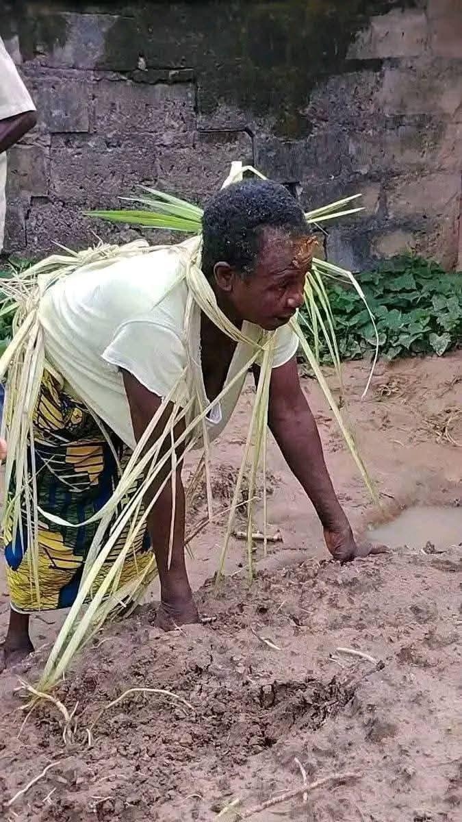 The elderly woman, reportedly accused of witchcraft, during her public humiliation in Amanfu, Ugbawka.