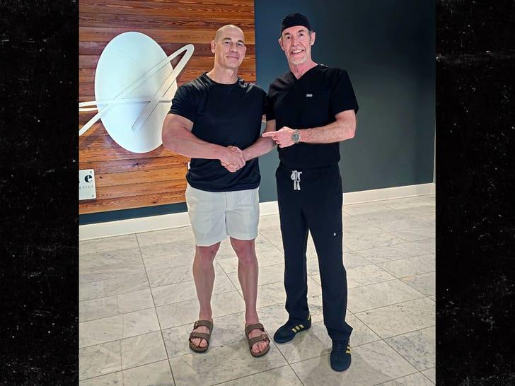 A photo of John Cena with Dr. Ken Anderson, his hair restoration surgeon