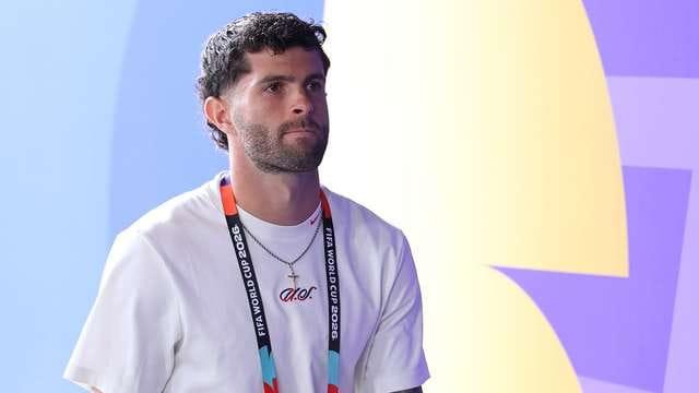 Christian Pulisic watches from the sidelines during a FIFA World Cup 2026 Group D match between USA and Australia.