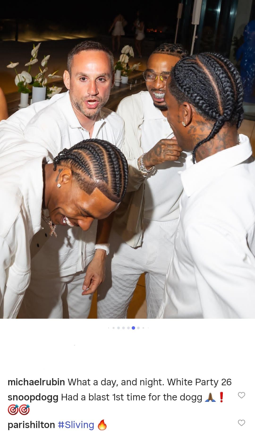 Guests enjoying the festivities at Michael Rubin's exclusive July 4th White Party celebration.