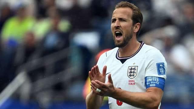 England striker Harry Kane on the pitch, focused on the game.