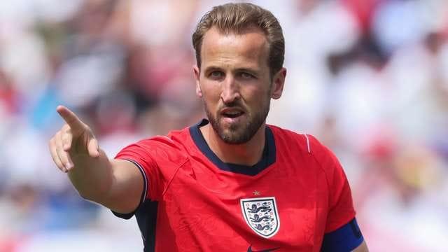 Harry Kane representing England in his national team kit.