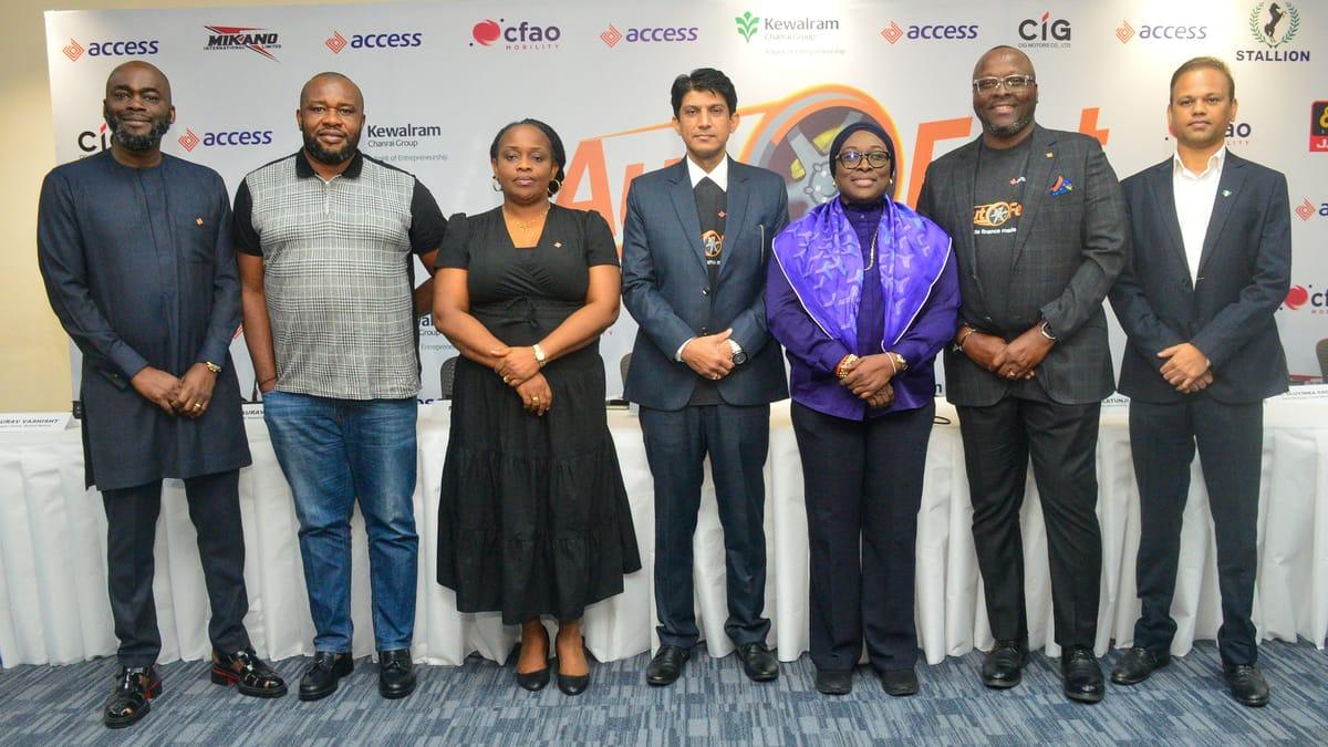 Access Bank executives and representatives from partner automotive companies discussing the new vehicle financing initiative.