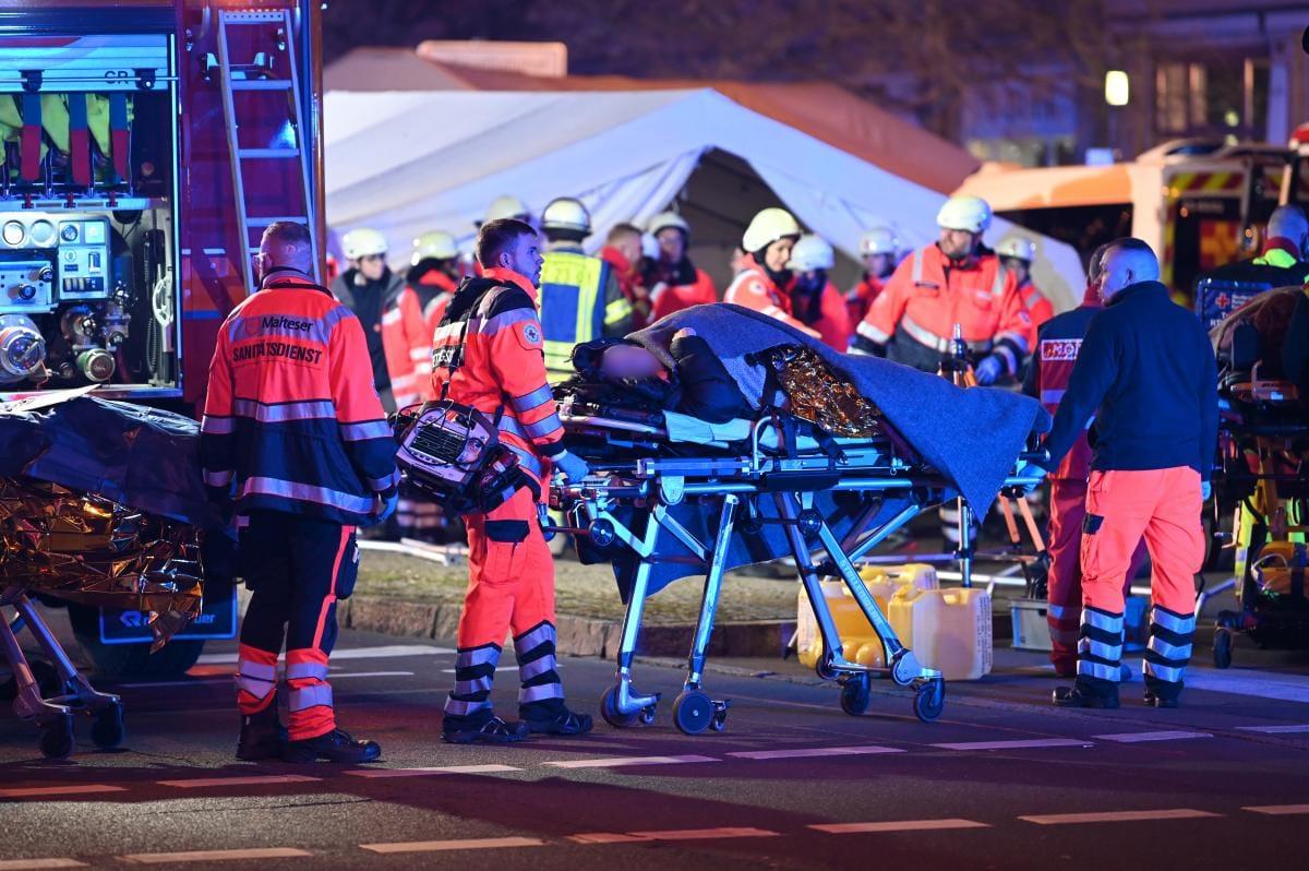 A conceptual image depicting a car crash scene or a memorial at the Magdeburg Christmas market, symbolizing the tragic event.