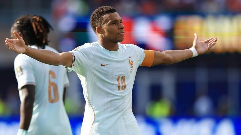 France's Kylian Mbappe on the field after a crucial goal in the World Cup.