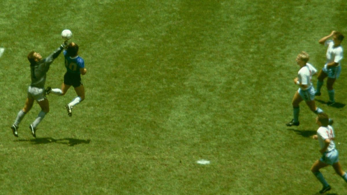Diego Maradona scoring his famous 'Hand of God' goal against England in the 1986 World Cup.