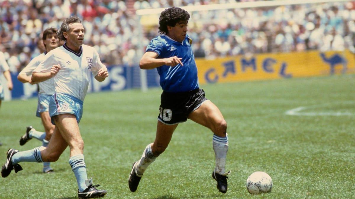 Diego Maradona dribbling with the ball during Argentina's 1986 World Cup victory over England.