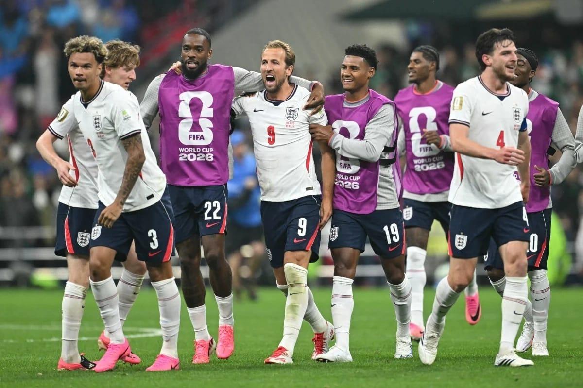 England players celebrating during their 2026 World Cup round of 16 victory against Mexico in Mexico City.