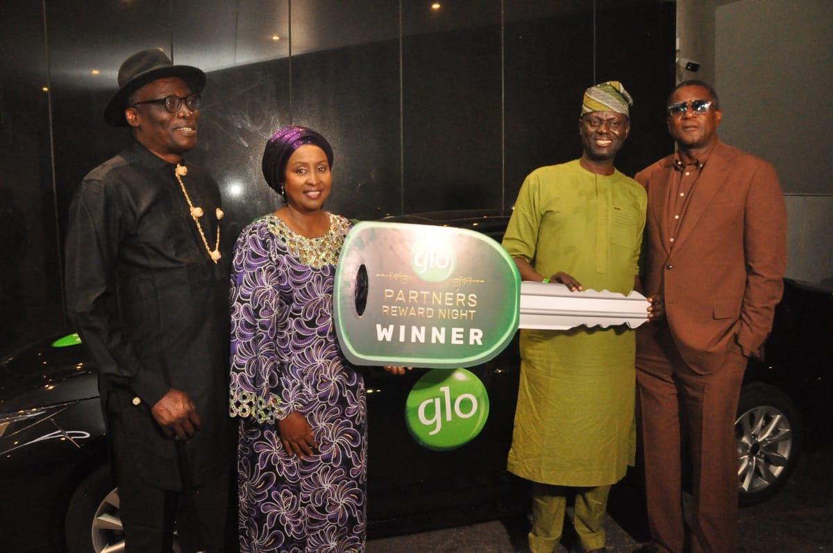 Award recipients proudly display their prizes at the Globacom event.