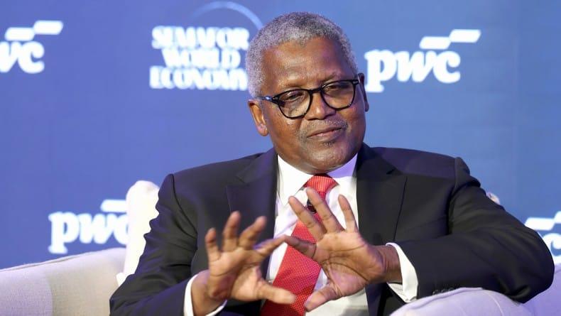 Aliko Dangote, President and CEO of Dangote Group, addressing an audience at a global economic event.