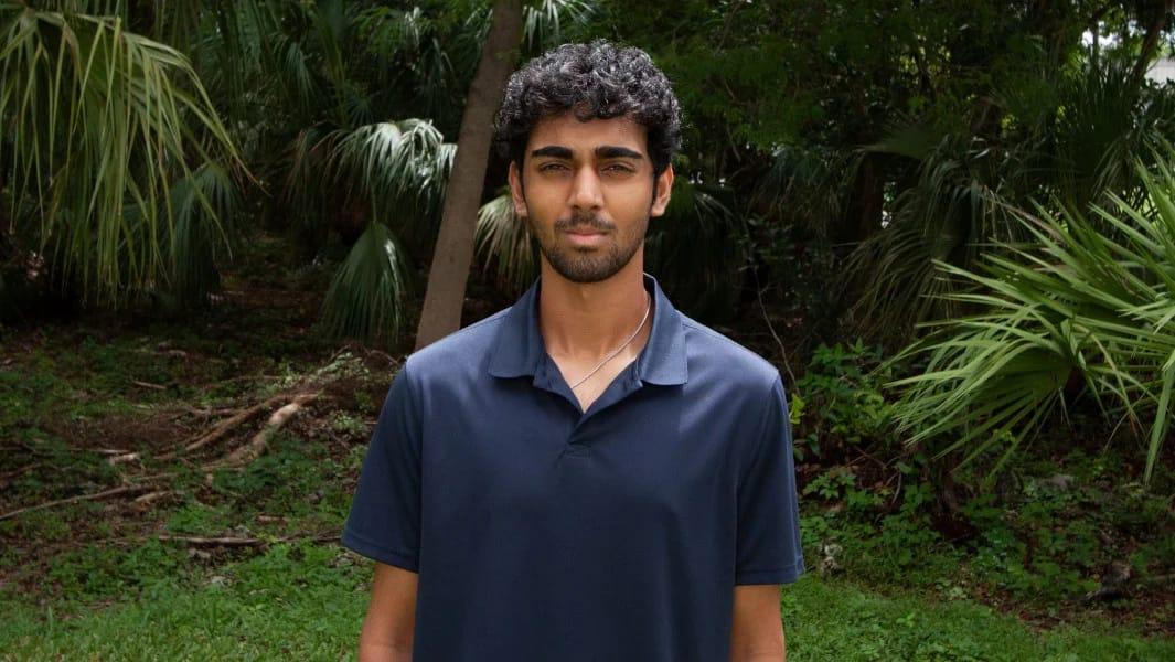 A portrait of Nathan Thomas, recognized as the world's youngest male professor.