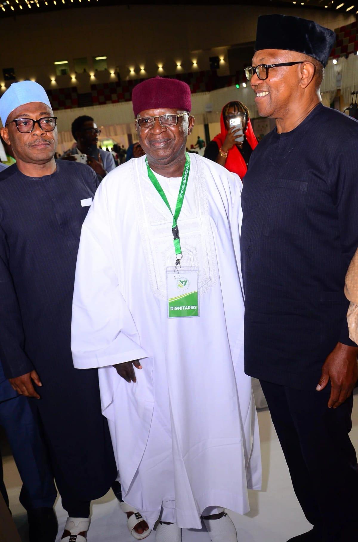 AA Presidential candidate Adekunle Omo-Aje (center) and Peter Obi, the Nigeria Democratic Party's presidential candidate, after signing the National Peace Accord in Abuja.