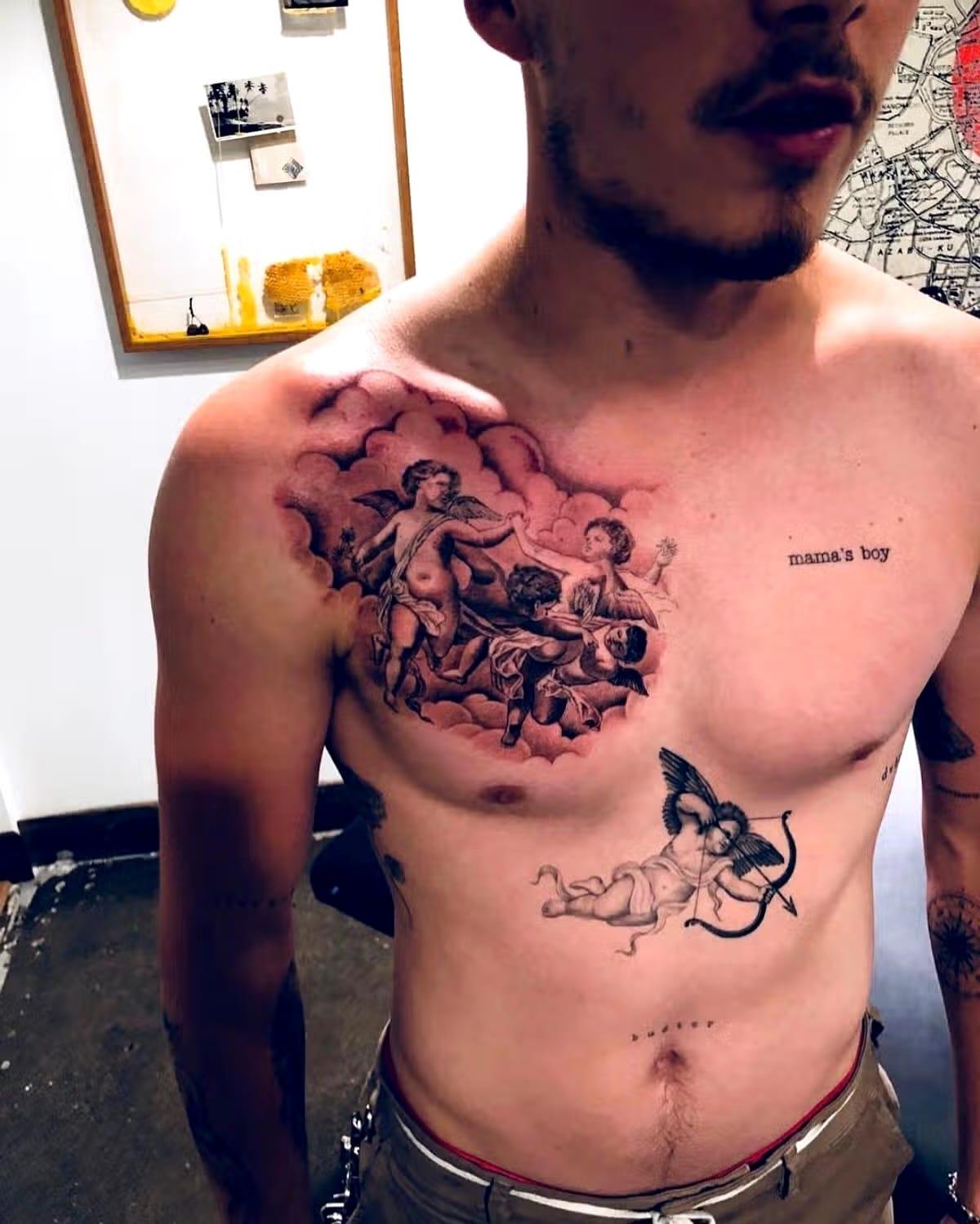 A close-up view of Brooklyn Beckham's chest tattoos, revealing the significant cover-ups.